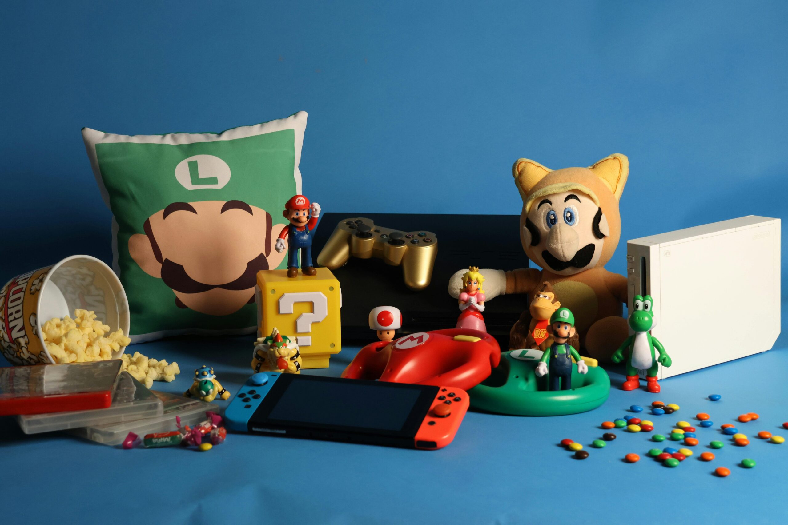 A vibrant gaming tattoo featuring Mario and Luigi helmets