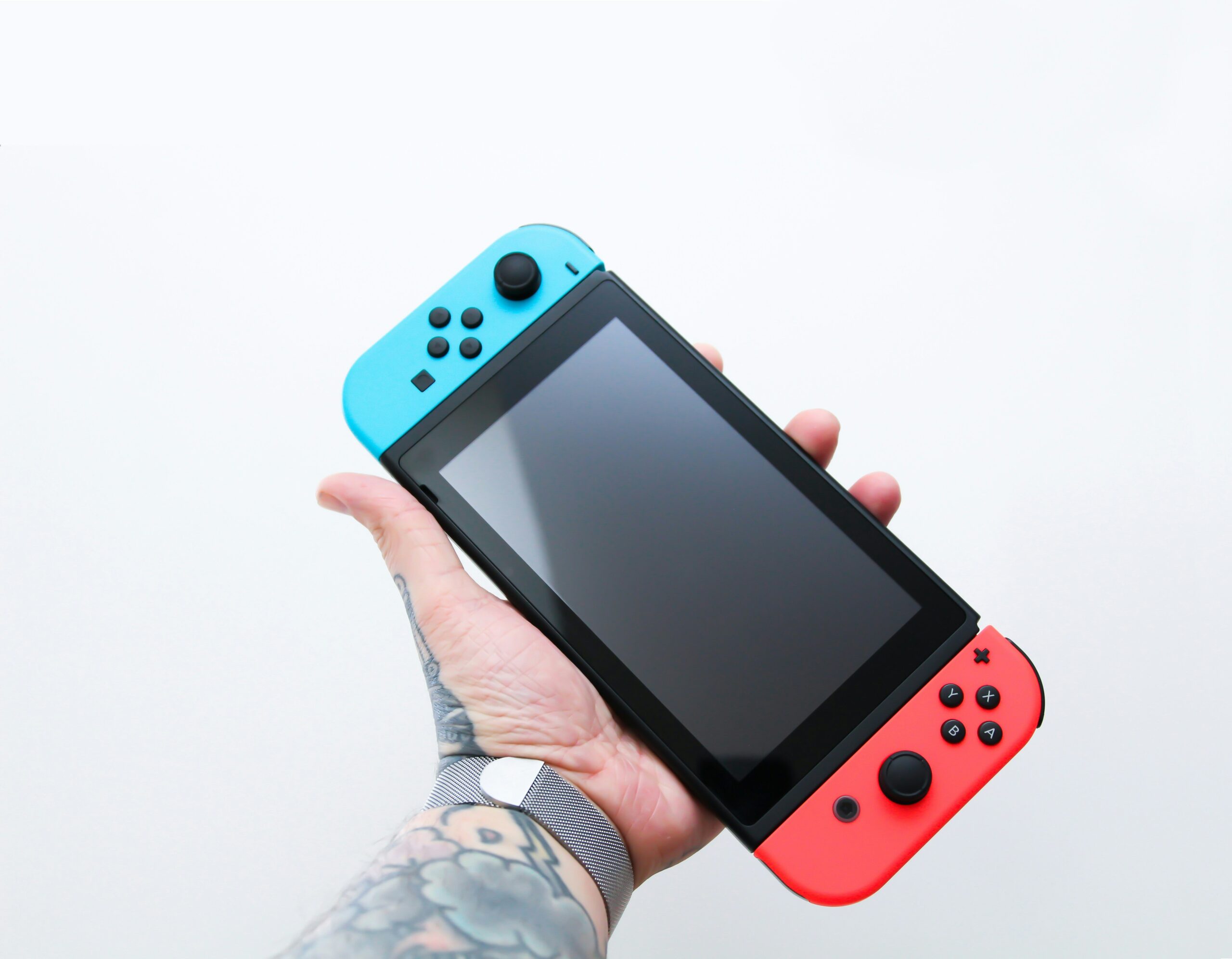 A vibrant sleeve tattoo featuring iconic video game characters