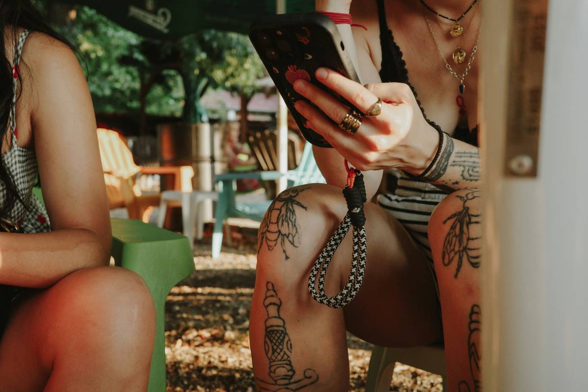Bottle of SPF50+ tattoo-specific sunscreen spray