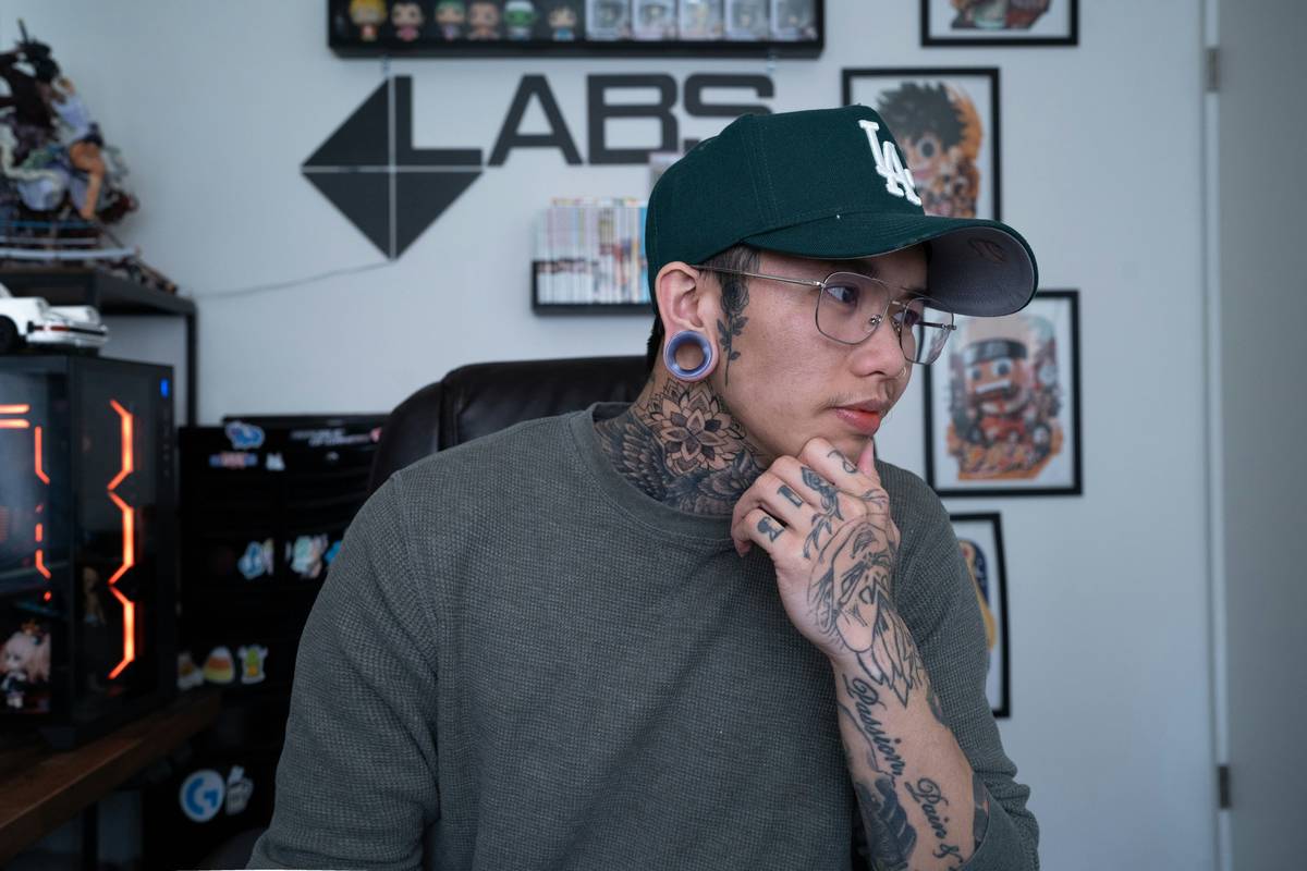 Highly-detailed black and grey tattoo featuring Samus Aran helmet from Metroid Prime series.