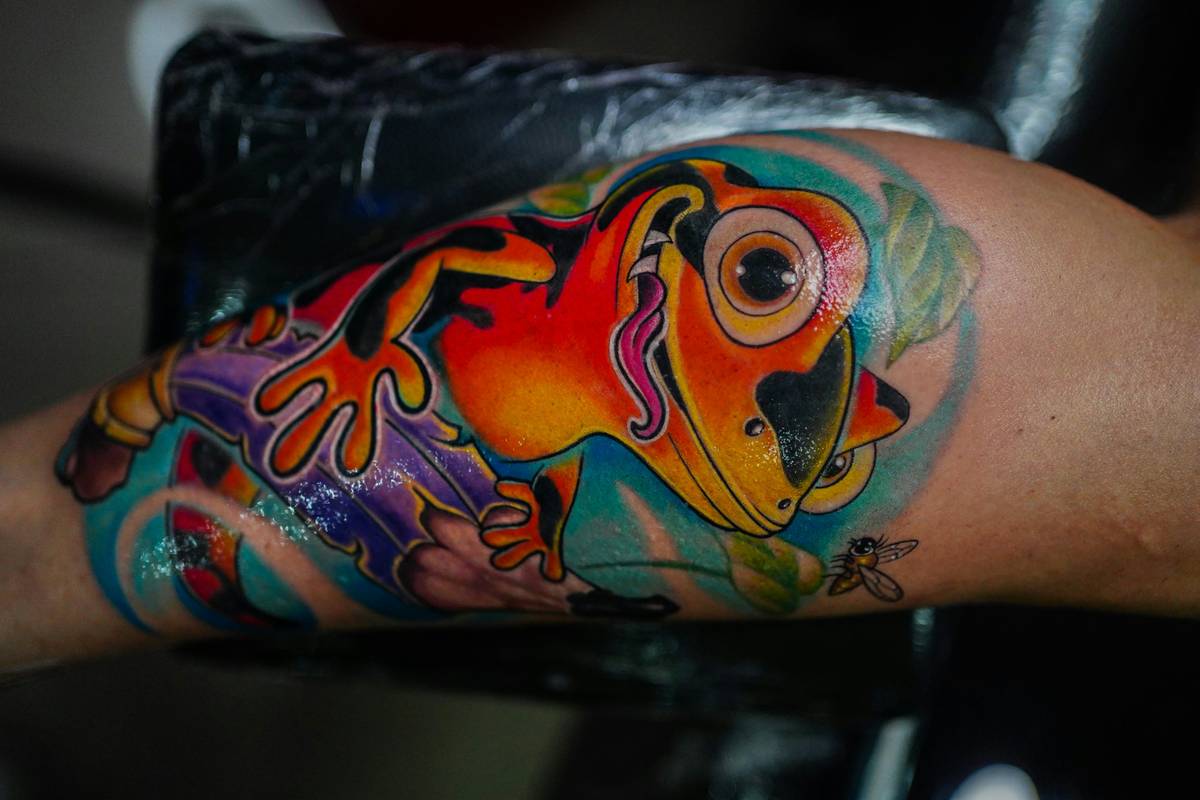 Different artistic styles of gaming tattoos including realistic and cartoonish versions