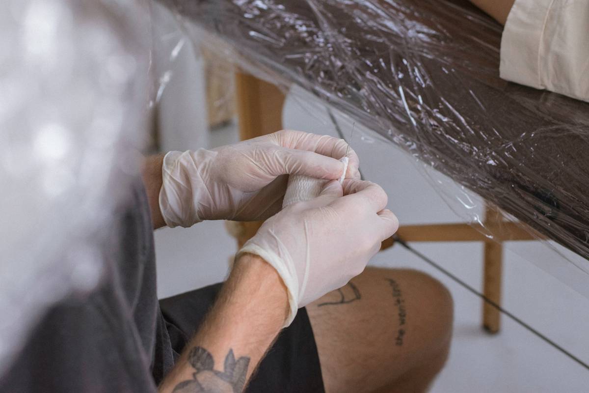 Infected tattoo showing signs of pus and swelling