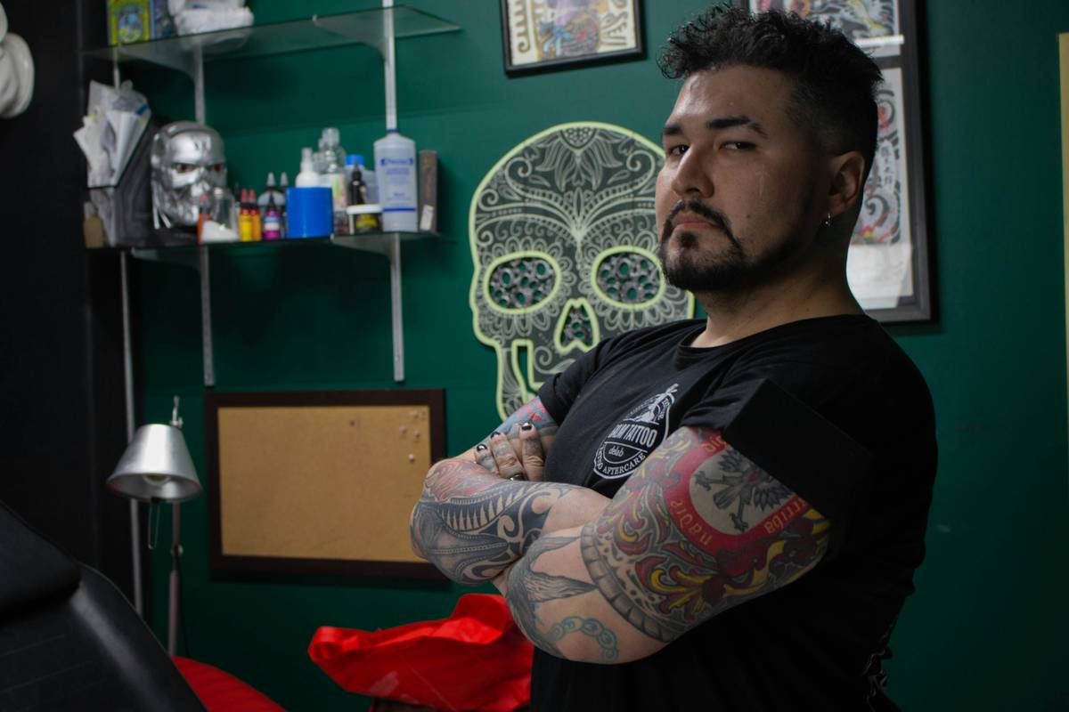 A close-up shot of a vibrant Genshin Impact ankle tattoo.