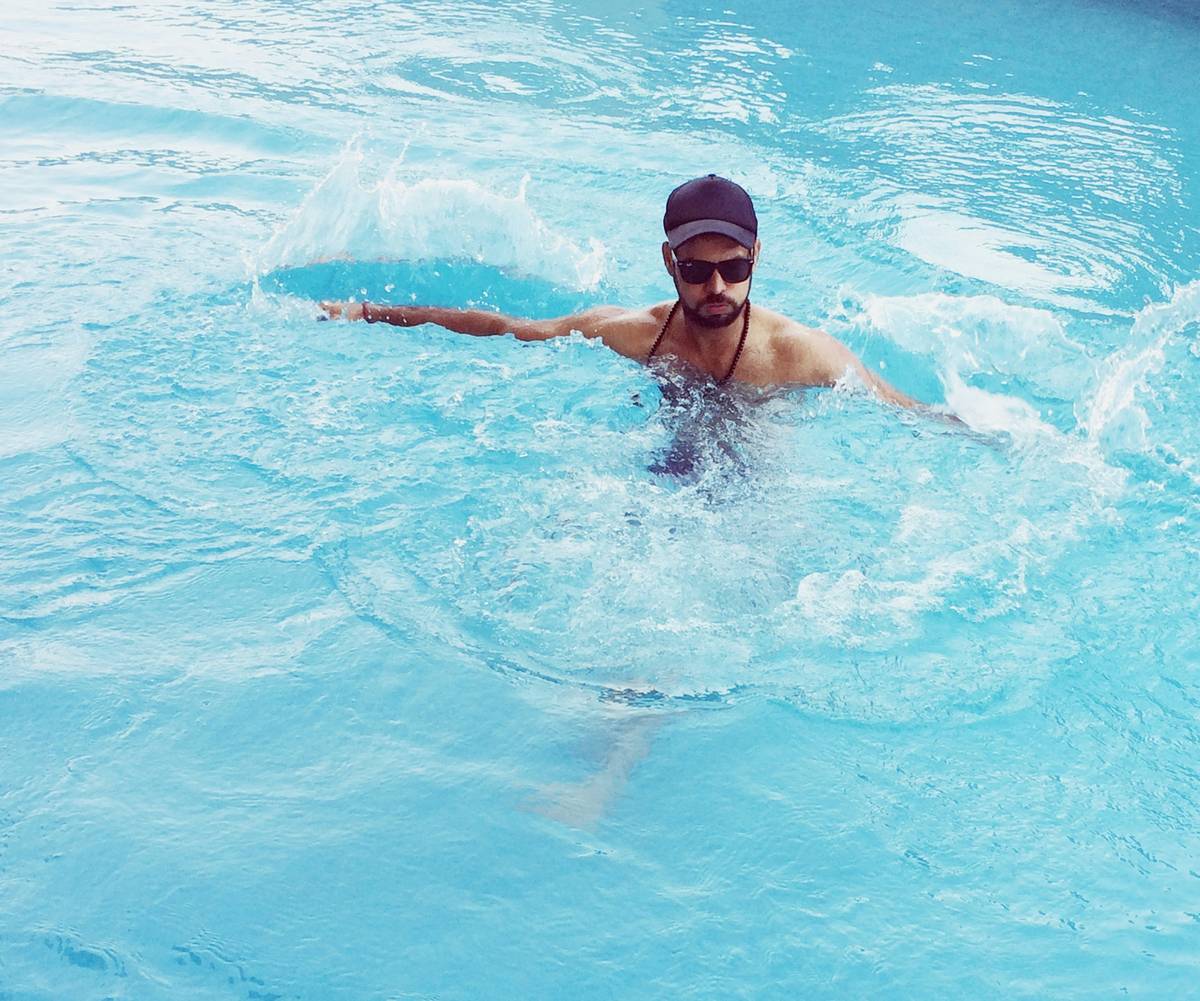 A side-by-side comparison showing a faded tattoo caused by early water exposure.