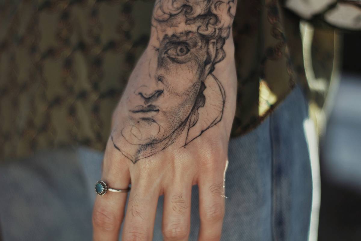 Weapon-Based Gaming Tattoo Art: Level Up Your Ink with These Epic Designs