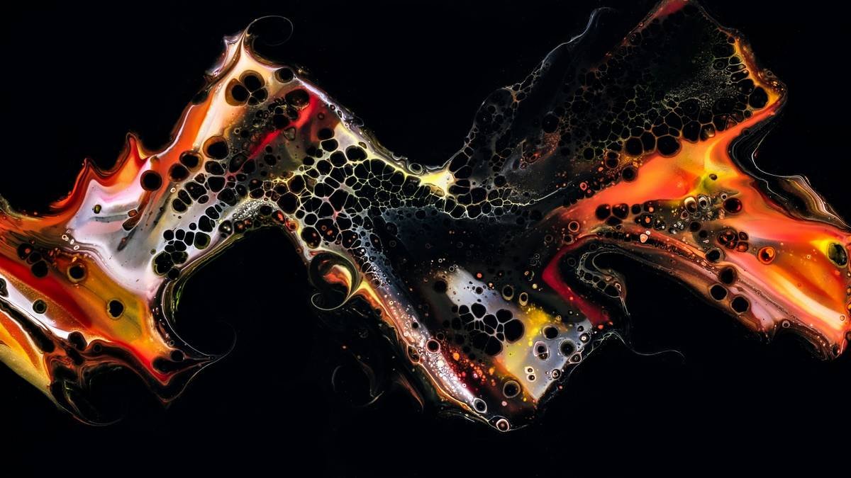 An abstract surrealist tattoo featuring a pixelated character surrounded by melting shapes and vibrant colors.