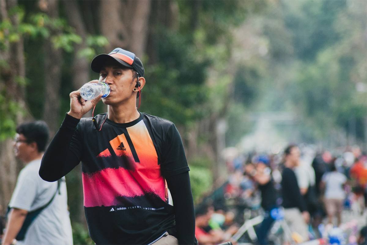 A men drinking water
