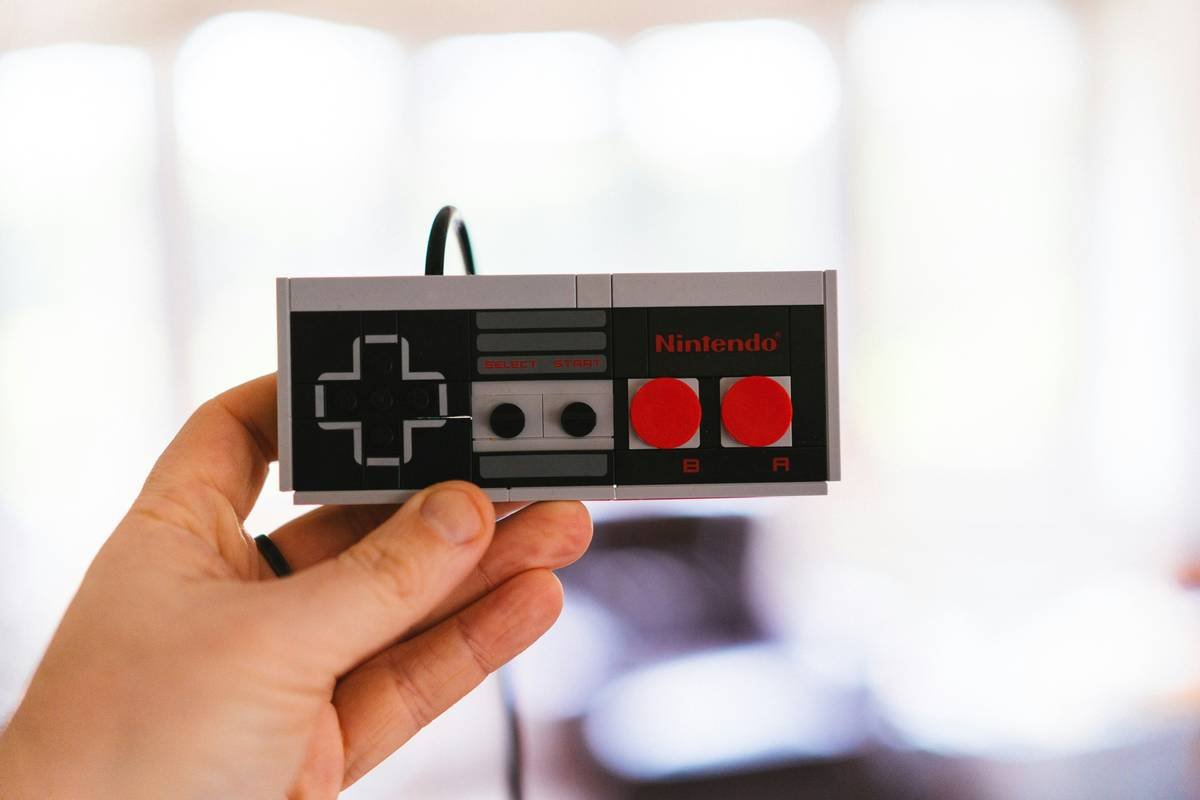 Side-by-side comparison: authentic 8 bit tattoo using NES color palette vs. generic 'pixel' tattoo with gradients and blurred edges