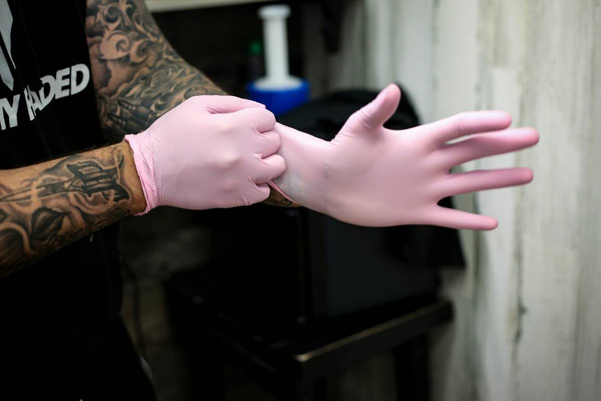 Milwaukee, WI. Businesses trying to getting around post quarantine, offering their services following all the safety measures for customers. Flashy Faded Barbershop was locked for two months.