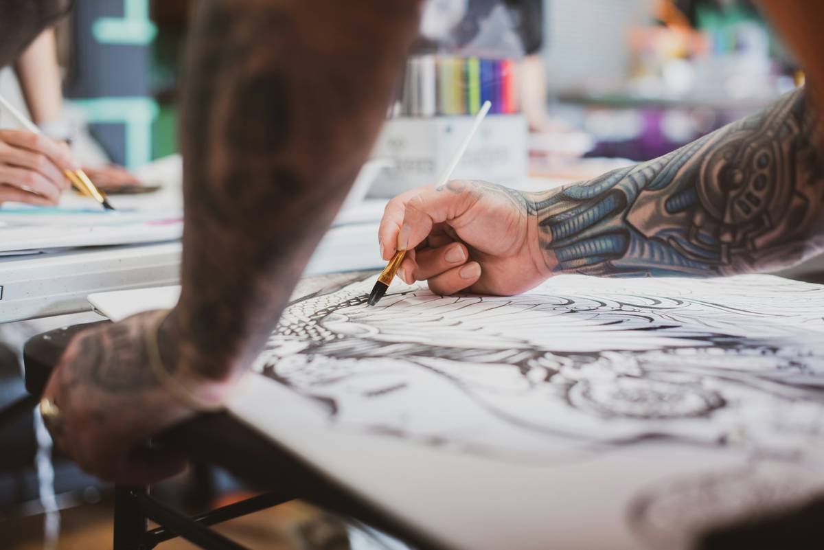 Local tattoo artists volunteer their time and gather at a local tattoo parlor to create artwork to be auctioned off in support of the Indianapolis Children’s Bureau.