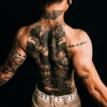tattoo artist Cyberpunk 2077: Where Neon Meets Needle
